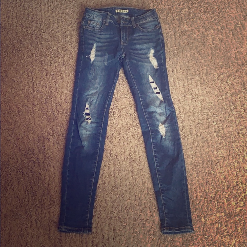 Blue skinny ripped jeans